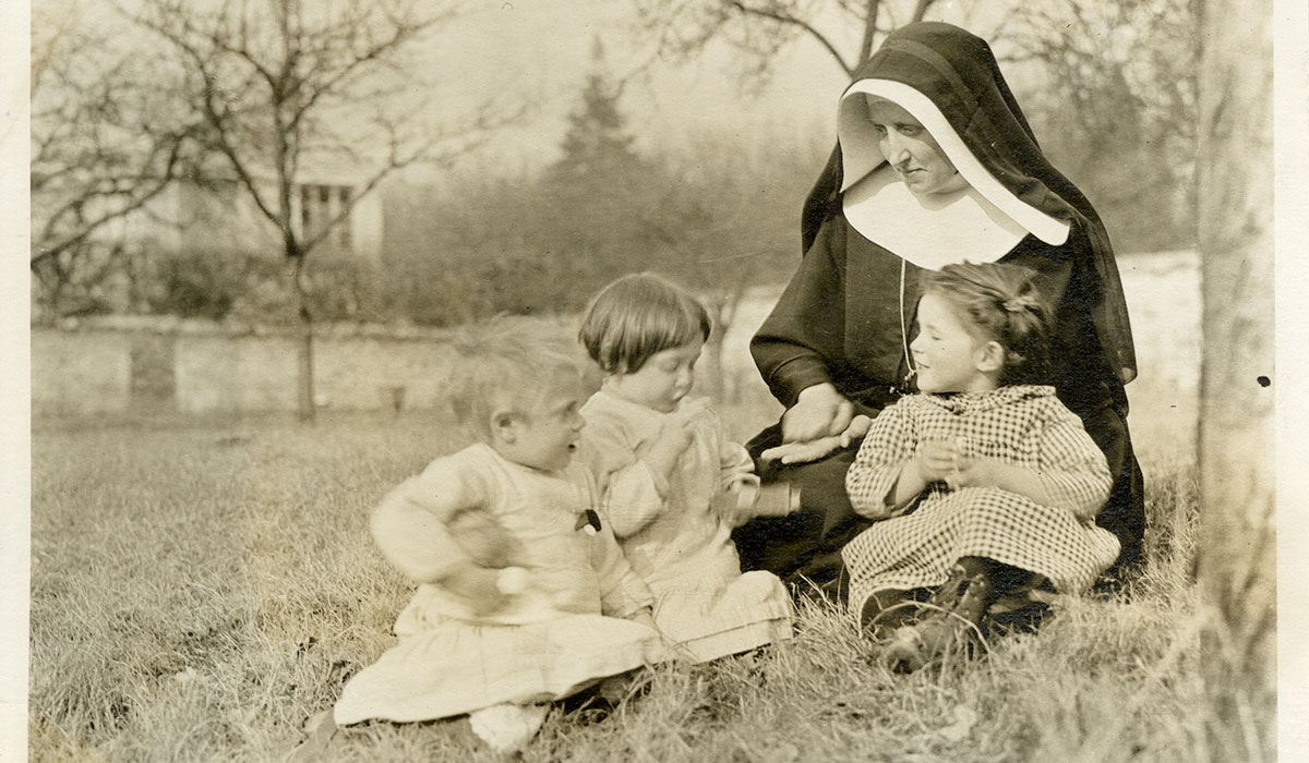 Nun with children