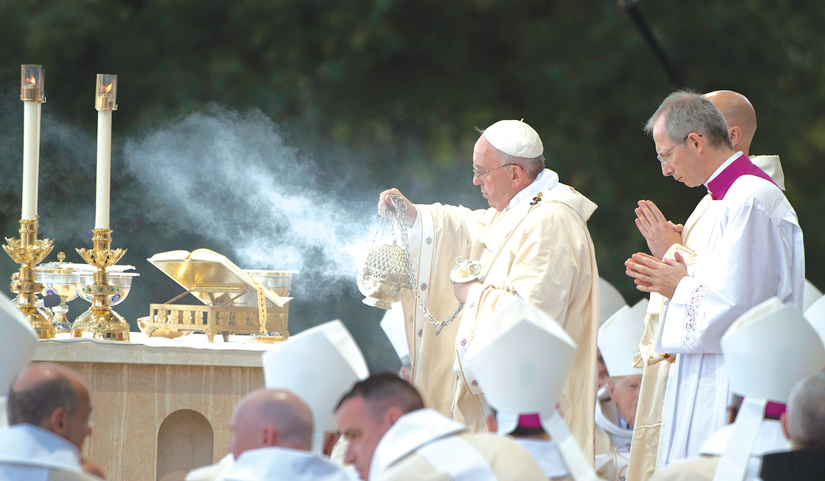Pope Francis celebrates mass on the steps of the Basilica