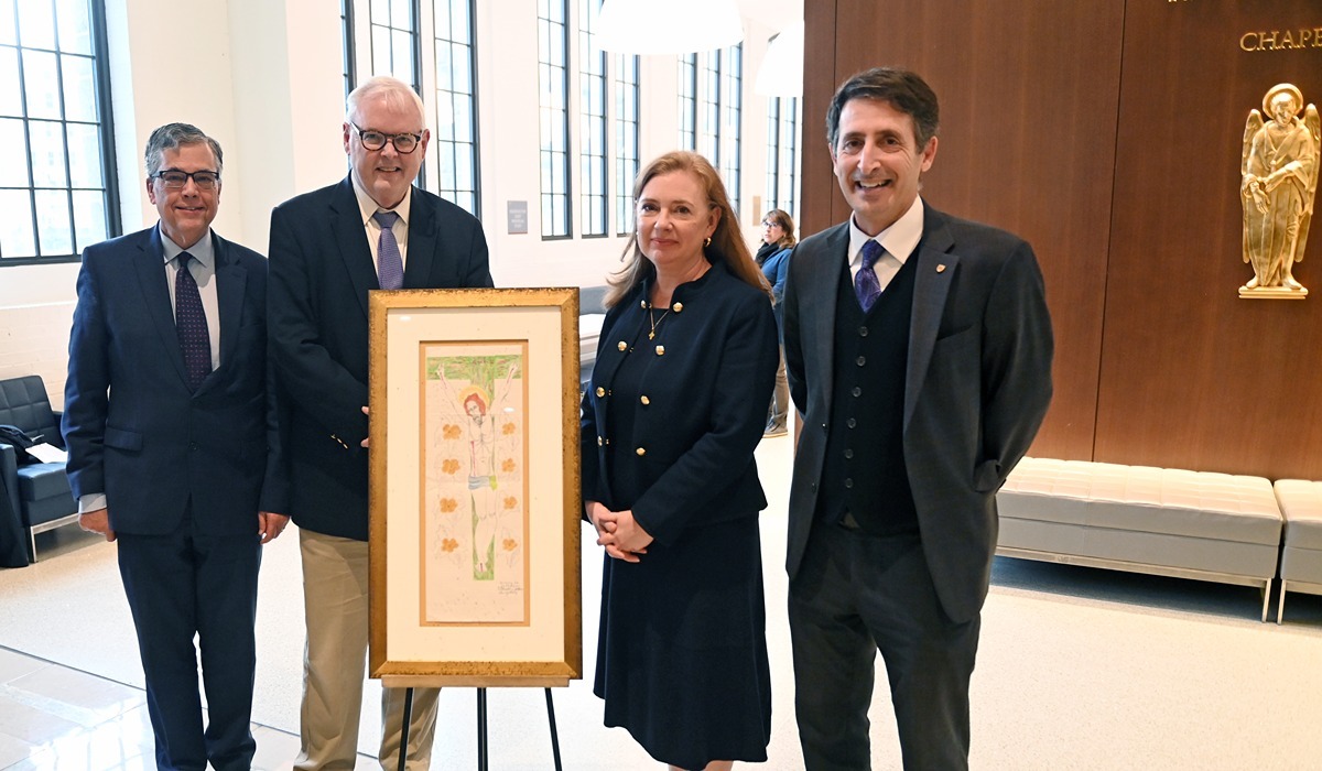 From left to right: University President Peter Kilpatrick, William McGurn, University trustee Julie McGurn, and Busch School of Business Dean Andrew Abela