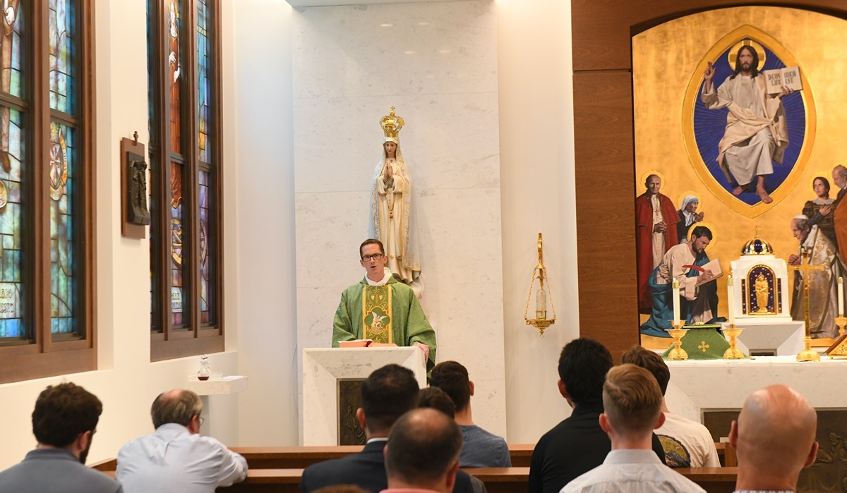 Rev. Bernard Knapke, O.P., gives his homily during a campus Mass to pray for healing and peace in St. Michael the Archangel Chapel in Maloney Hall at 12:05 p.m. July 20.