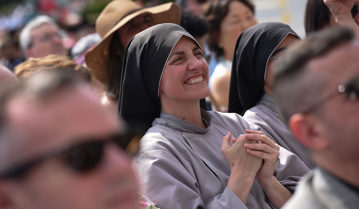 Nun smiling at Commencement