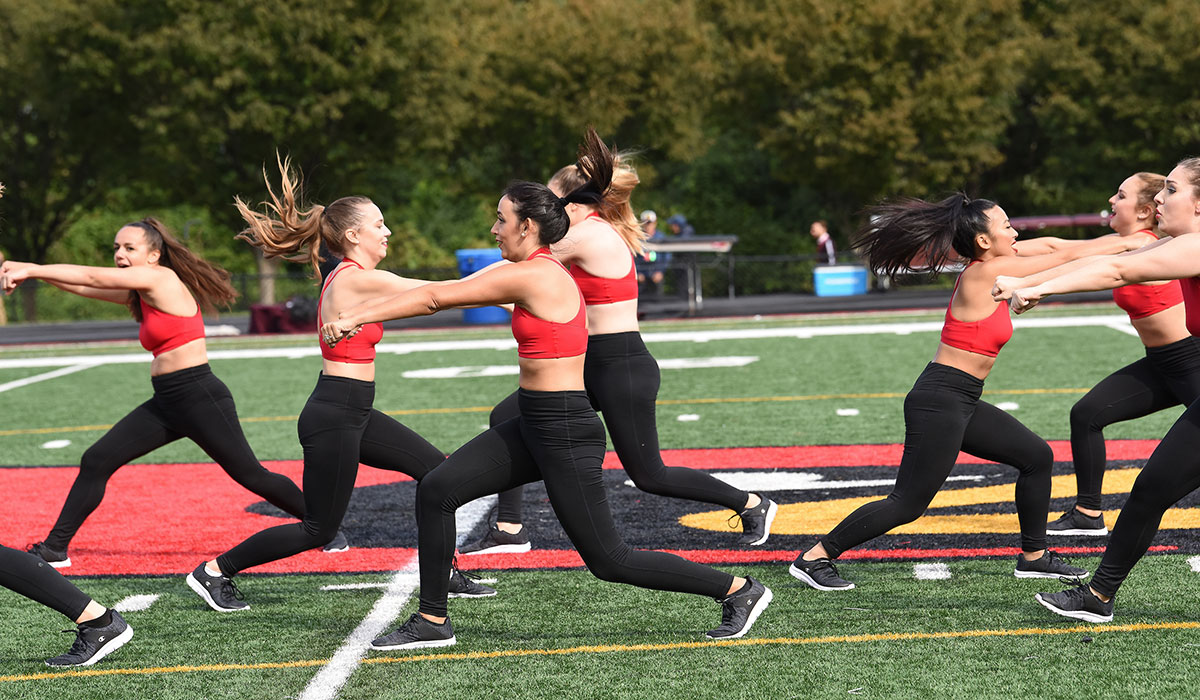 Dancers perform during football game