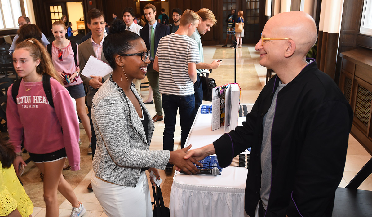 Seth Godin meets with students after speaking