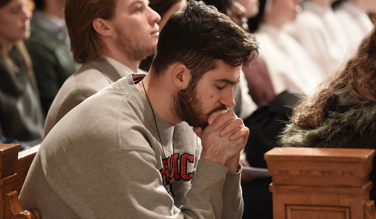 Student in prayer