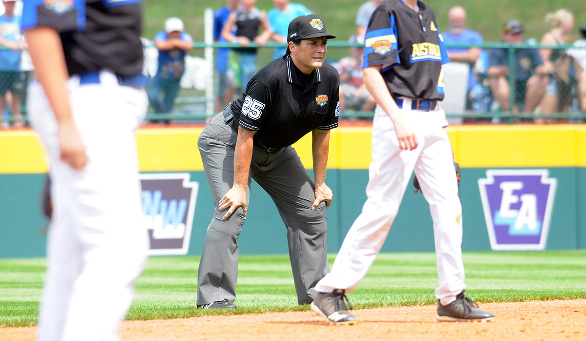 Kelly Dine umpiring at second base for a little league world series game