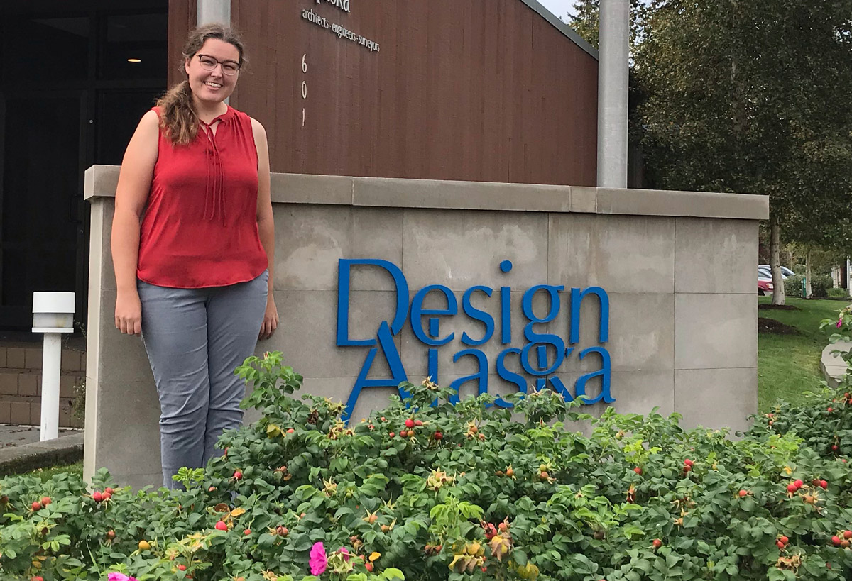 Morgan Allen in front of Design Alaska building