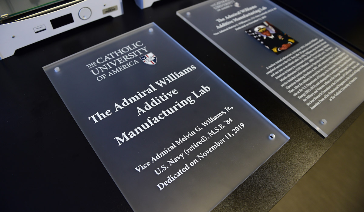 Plaques dedicating Admiral Williams Additive Manufacturing Lab