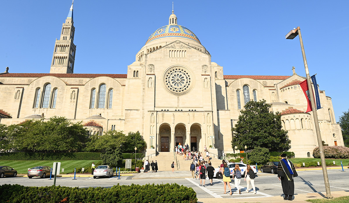 Students walking toward Basilica of the National Shrine of the Immaculate Conception