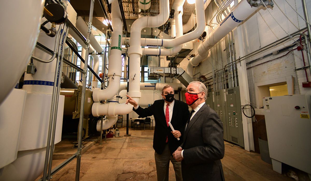 President John Garvey tours the university's power plant