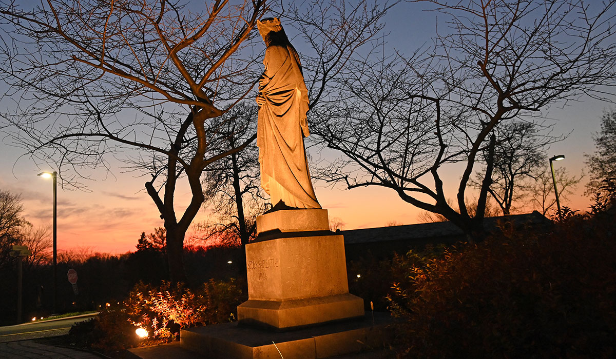 Mary, Seat of Wisdom statue at sunset