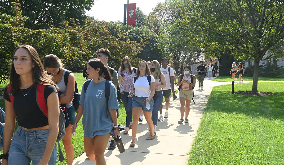 Line of students on walkway