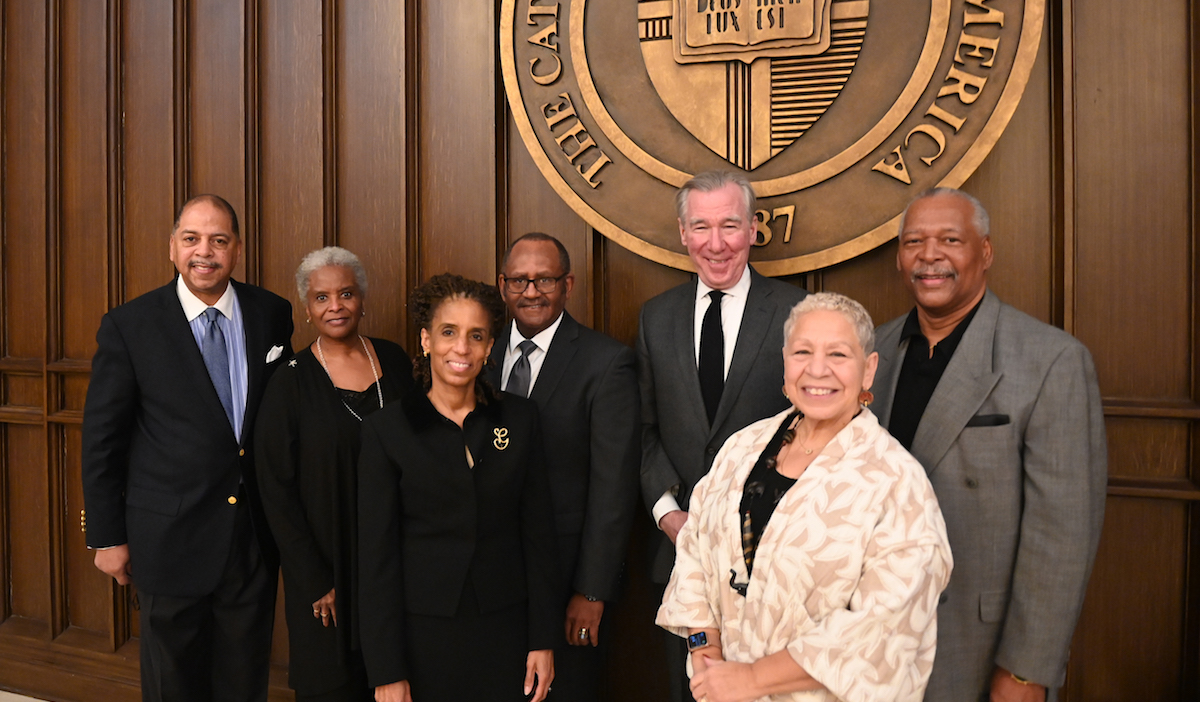 President Garvey and Black alumni pose for a picture at the 2022 MLK Teach-In