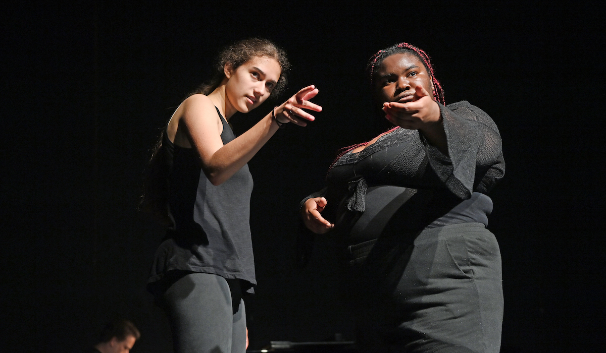 students performing on stage during the final dress rehearsal of the summer high school drama institute