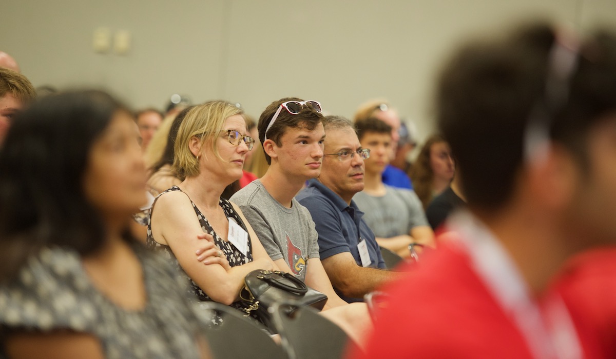 First-year students and parents listening to presenters at one of the orientation sessions. 