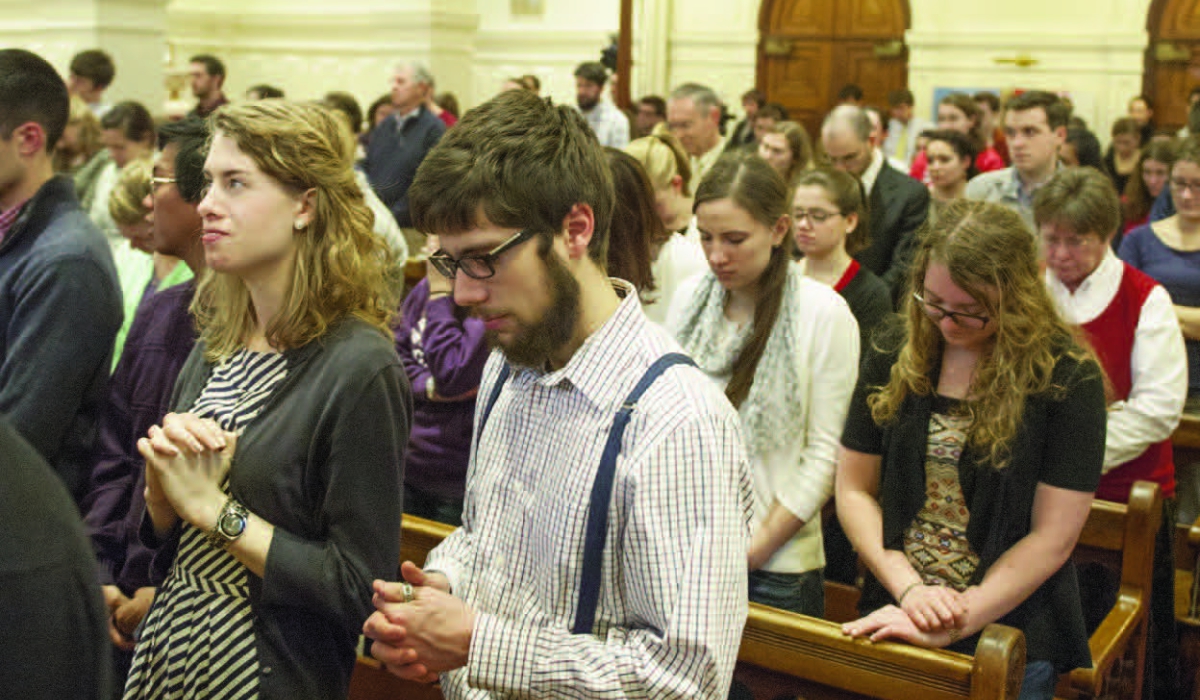 Students celebrating the Mass