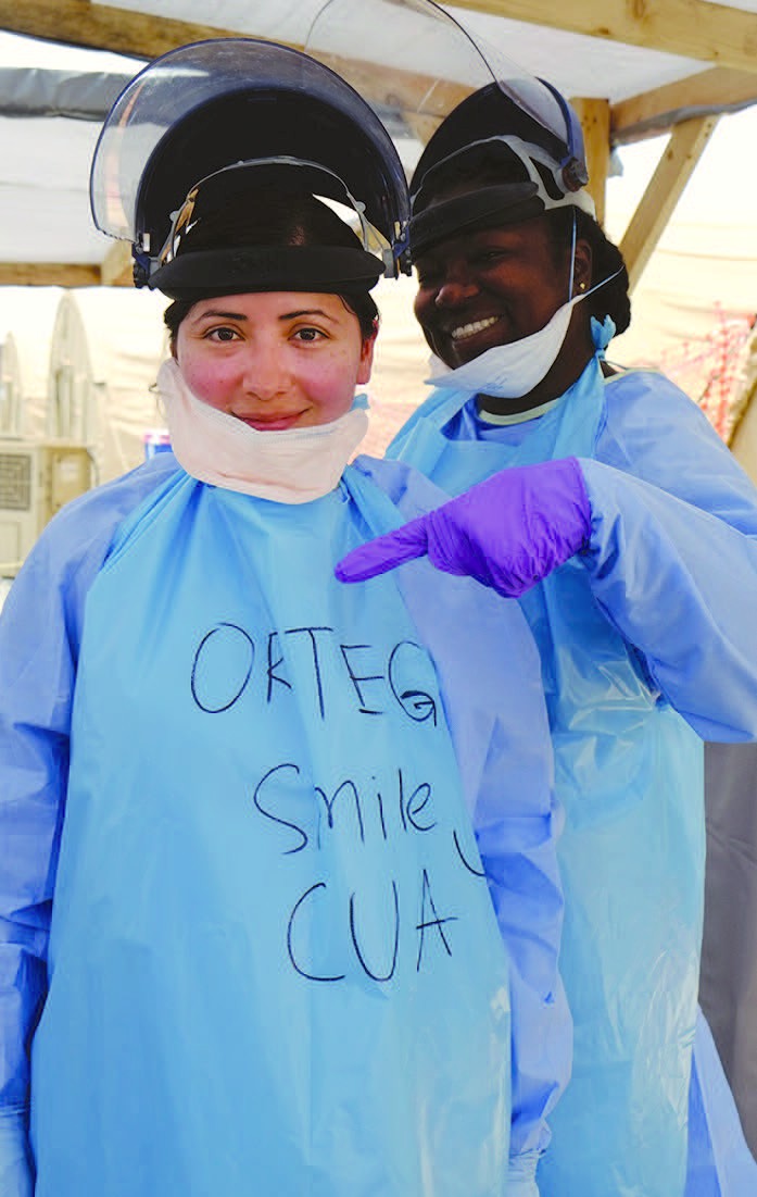 Lt. Ortega during onsite training for decontamination of officers coming out of the hot zone (known as doffing). They each personalized their aprons to add levity to the serious process.