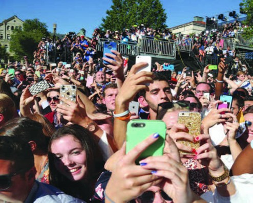 Students anxiously waiting to get a photo of Pope Francis