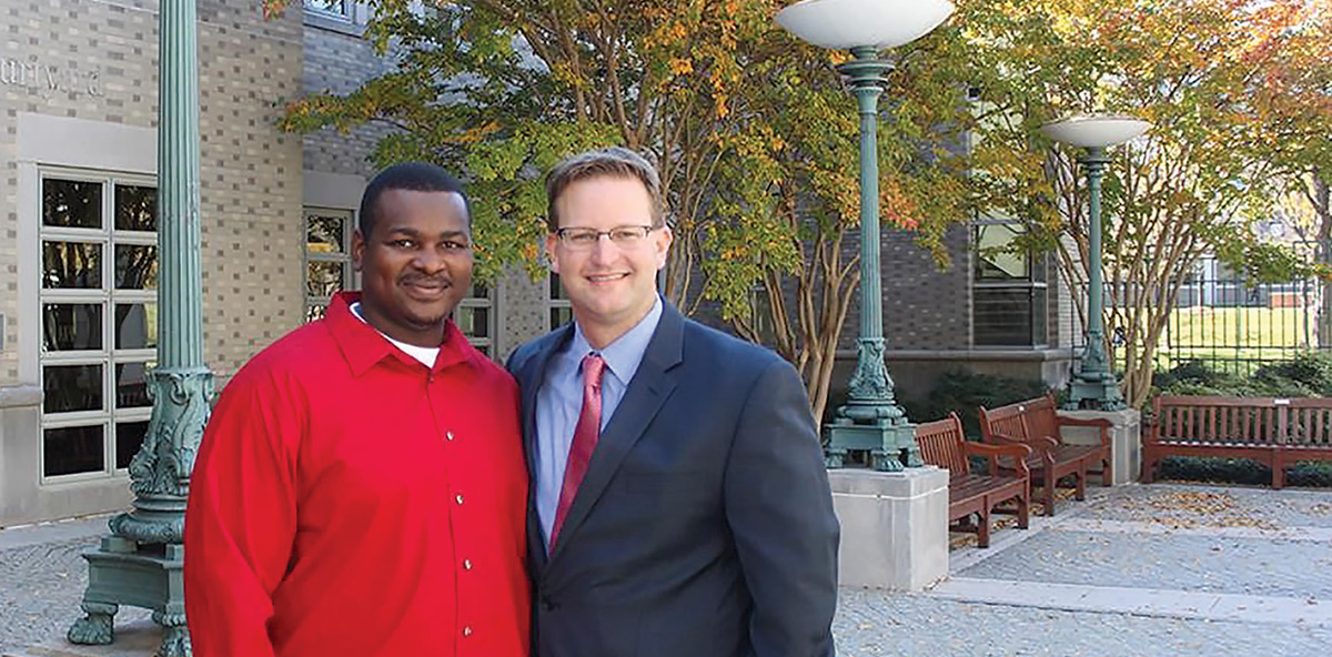Alfred Dewayne Brown with Brian Stolarz outside the Columbus School of Law.