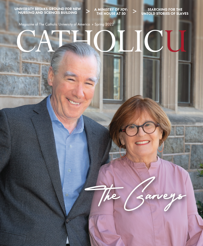 Cover of CatholicU Magazine. On it are John and Jeanne Garvey smiling