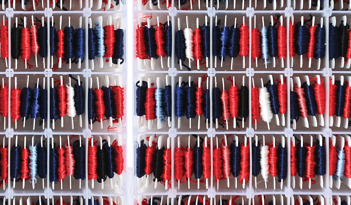 red and blue thread spools