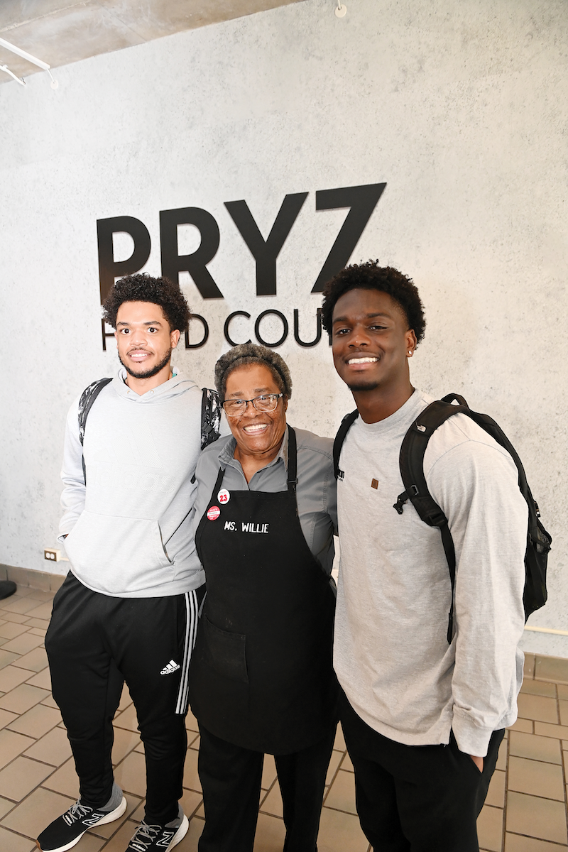Willie Joyner embraces students throughout the day at the Pryz Food Court.