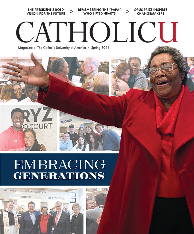 Cover of CatholicU Magazine. On it, Ms. Willie stands with arms outstretched.