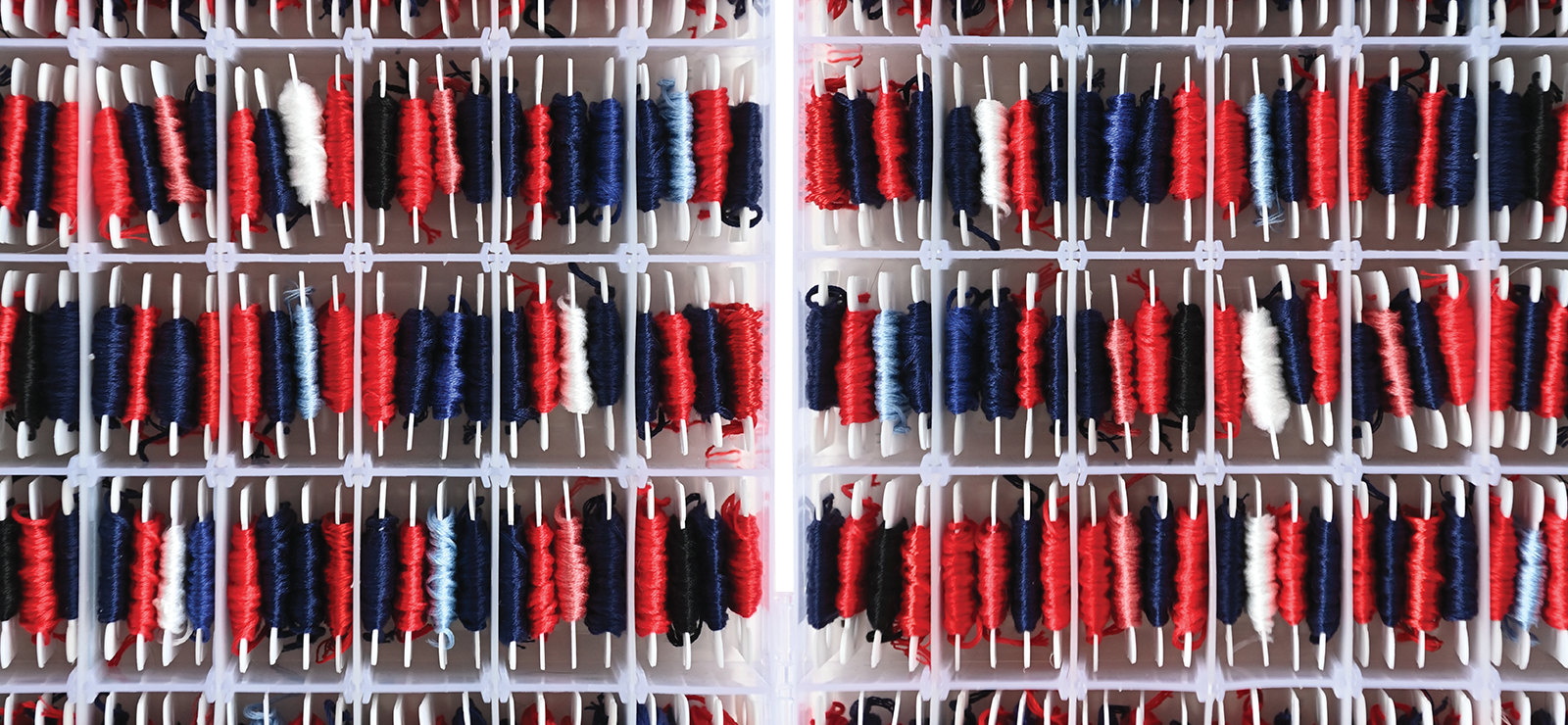 spools of red and blue thread