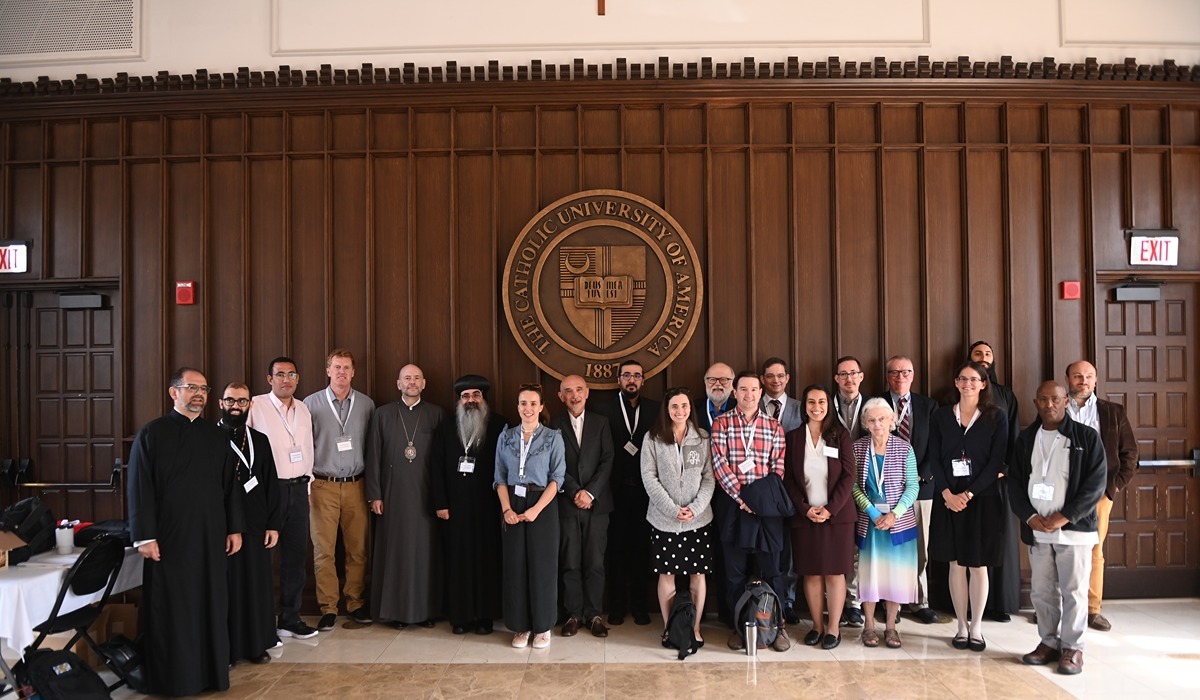 A group of presenters and attendees of the “The Liturgies of the Church of Alexandria: From Late-Antique Origins to the Medieval Heritage: An International Symposium” in Heritage Hall. (Catholic University/Patrick G. Ryan)