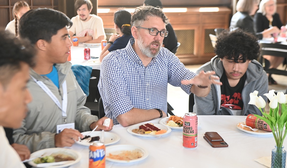 Academic Coach Josef Simpson, a first generation college graduate, speaks with Take Flight pre-orientation participants. (Catholic University/Patrick G. Ryan) 