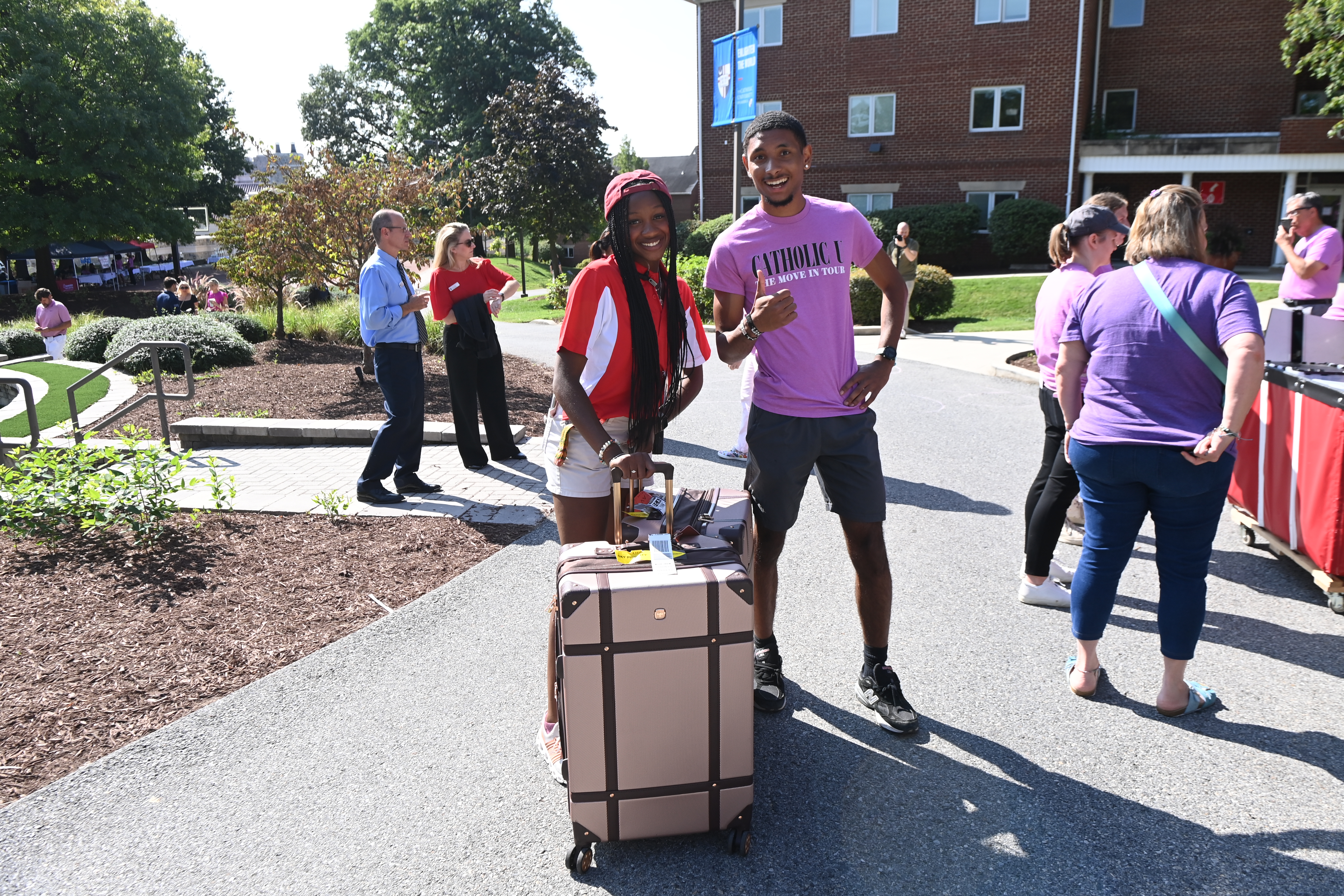 Nursing senior Anisa Ellis is all smiles as she helps out the team