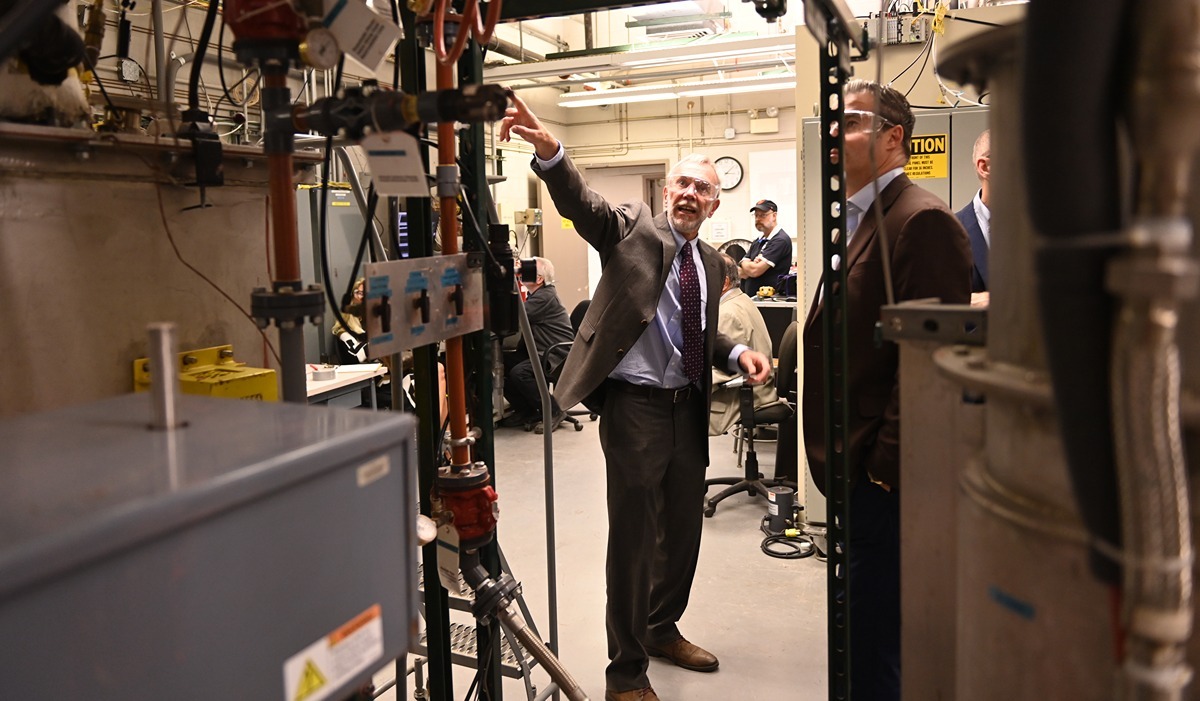 Physics Professor Ian Pegg leads a tour of the Vitreous State Laboratory (Catholic University/Patrick G. Ryan) 