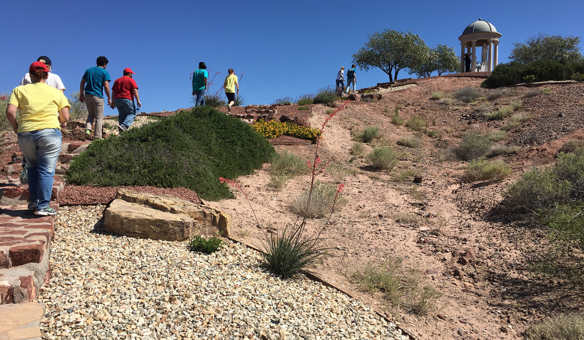 Students hike to see a small shrine, as part of their border immersion trip to Texas and New Mexico this May.