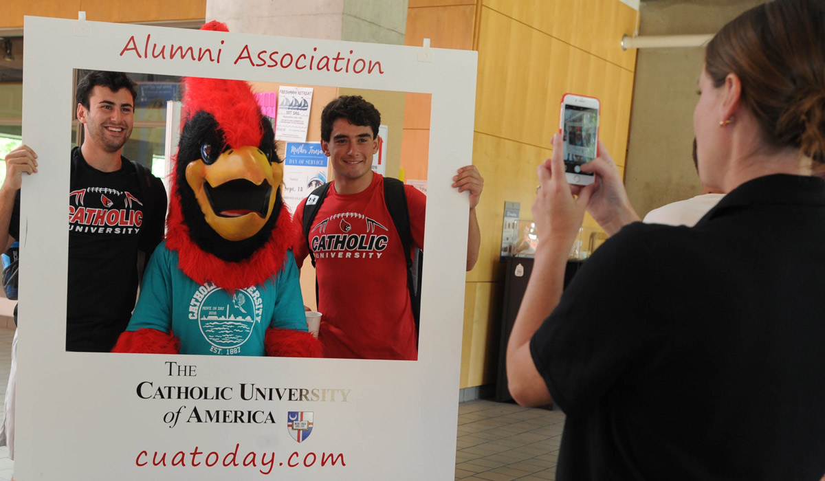 New members of the Class of 2020 get acquainted with Red, the Catholic University mascot