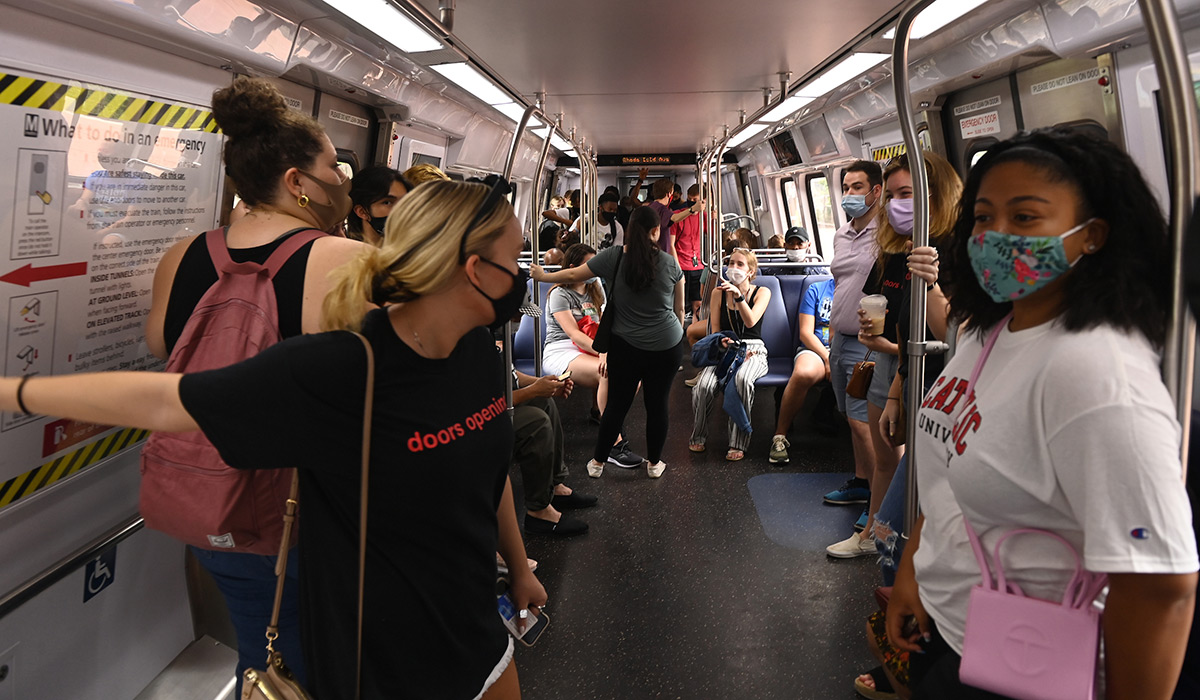 Students riding a Metro train