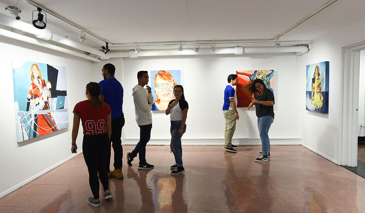 Students checking out art exhibit