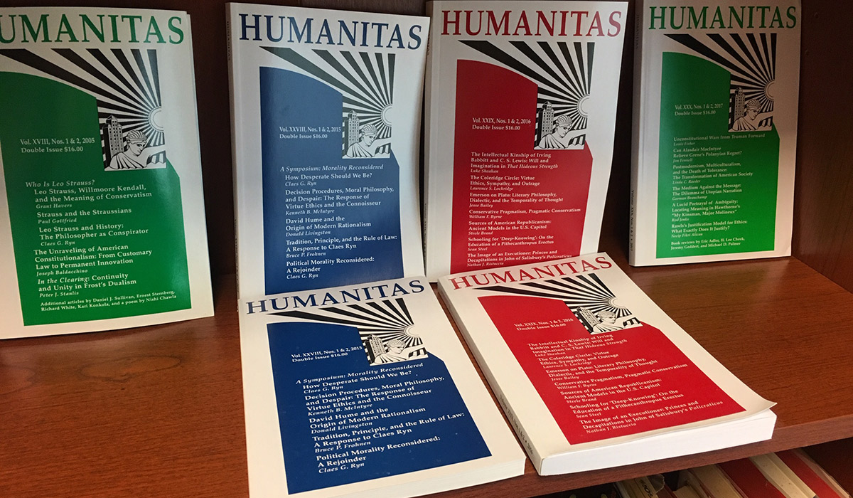 An image of the newest edition of humanitas journals on a bookshelf