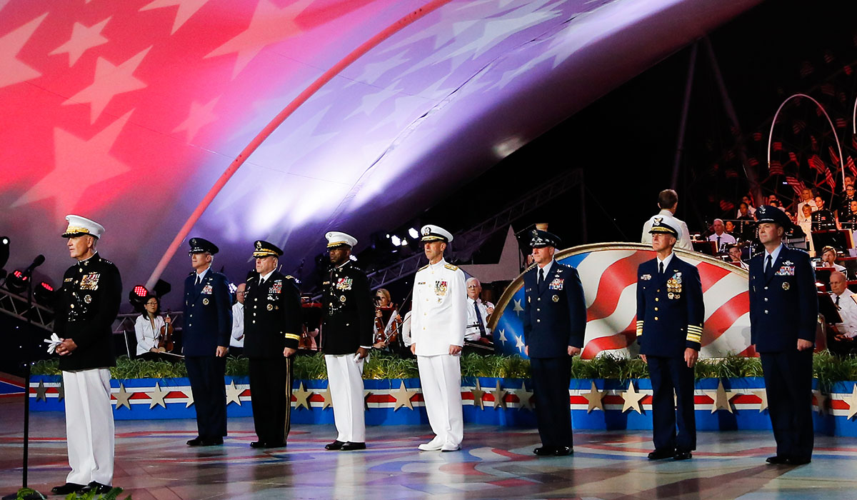 Military service members on stage during the concert 
