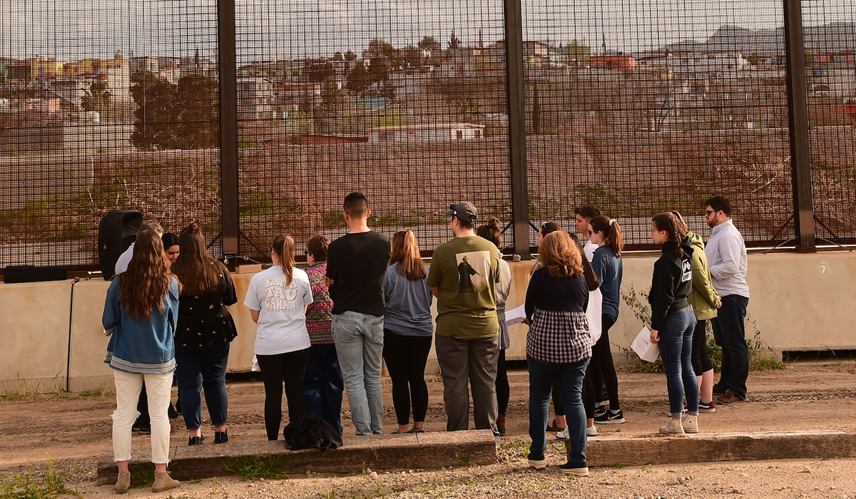 Students standing at the border with Mexico