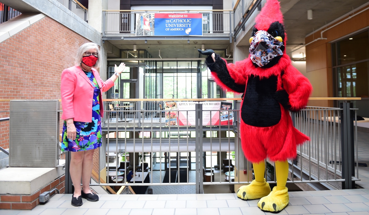 Red and Staff welcoming students back to campus