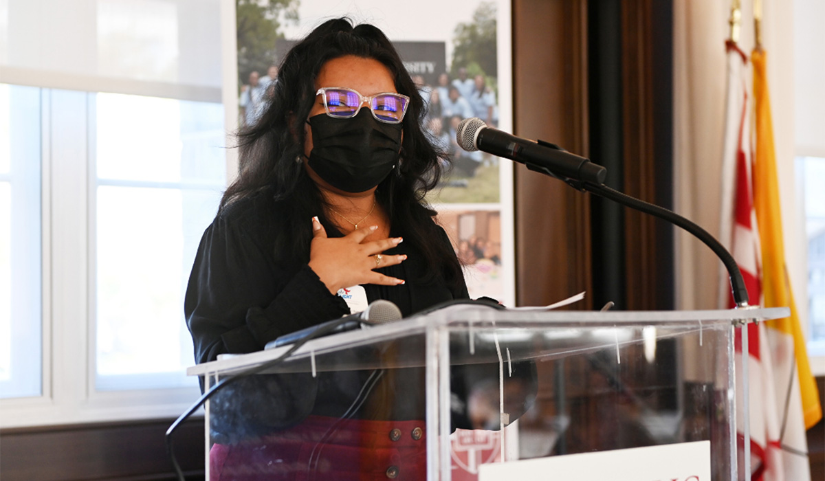 Fatima Vasquez Molina speaking at Take Flight luncheon