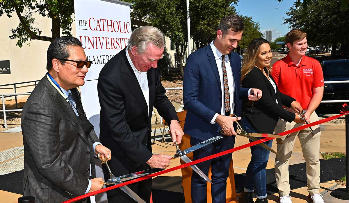 Pres. Garvey and stakeholders cutting ribbon at Tucson campus