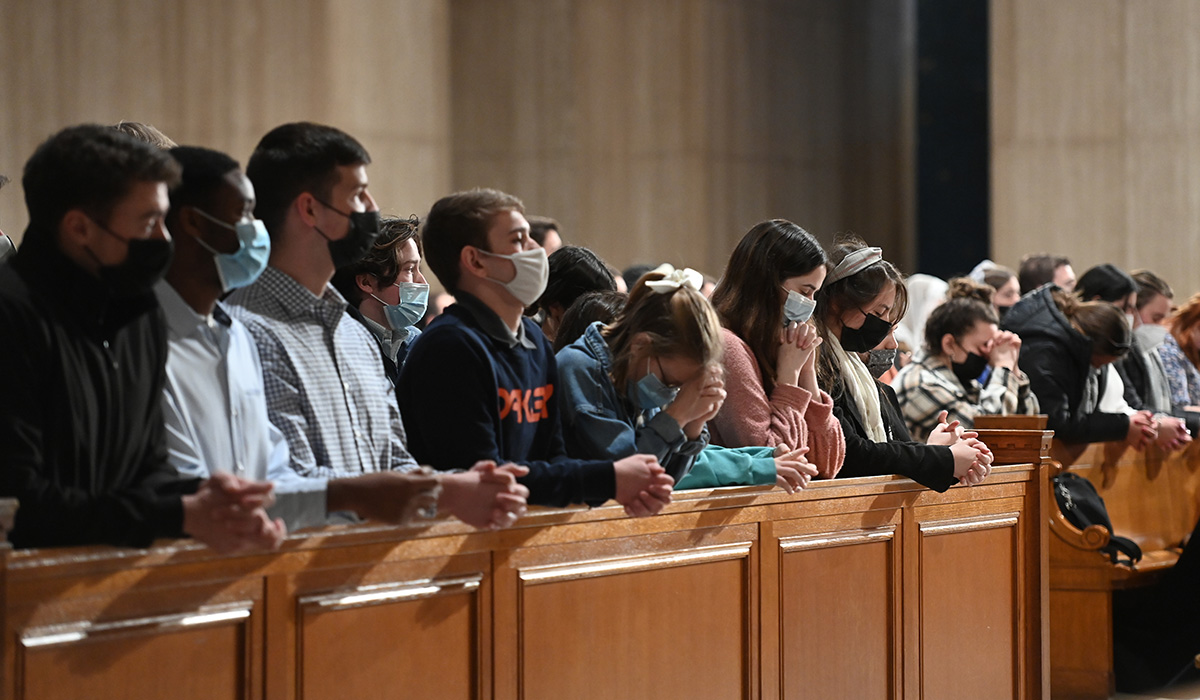 Students attend the St. Thomas Aquinas Mass in the Basilica of the National Shrine of the Immaculate Conception