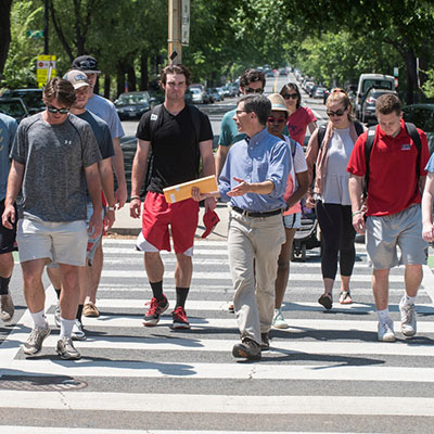 Students crossing city street